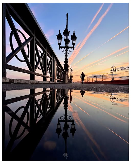 Twilight, streetlight and reflection shared by Matthieu Leherisse on Instagram